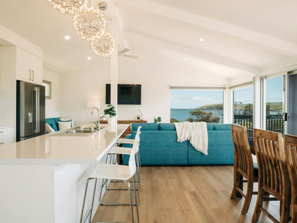 Upstairs open plan living area including full kitchen, dining area & lounge with 180 degree views