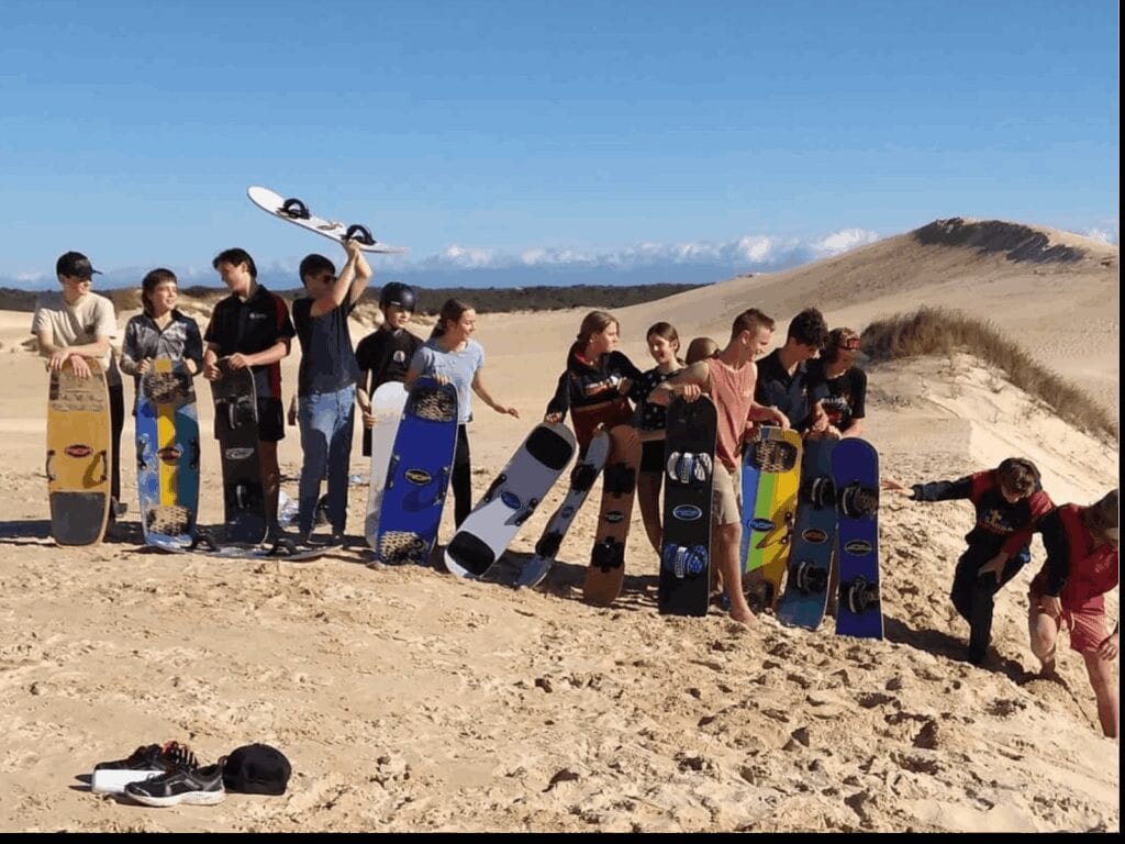 Participants getting ready for sandboarding on the dunes of Port Lincoln National Park